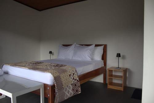 Postel nebo postele na pokoji v ubytování Village Río Celeste, Eco Lodge and Tours