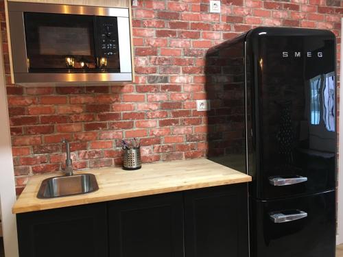 Kuchyň nebo kuchyňský kout v ubytování Practical room: Barcelona-Fira-Airport