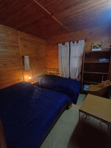 En eller flere senge i et værelse på Cabaña Del Jardín San Pedro De Colalao