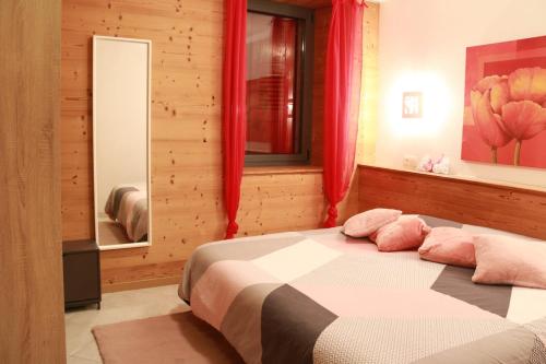 Postel nebo postele na pokoji v ubytování La Loge du Billat