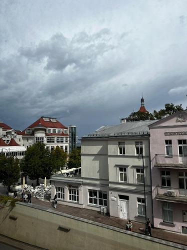 a group of buildings in a city with a sky at Apartament Blue Monte 60 in Sopot