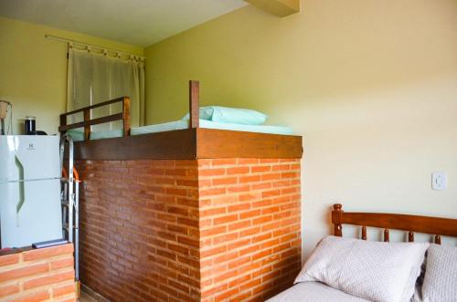 Een bed of bedden in een kamer bij Casa clima da montanha 1