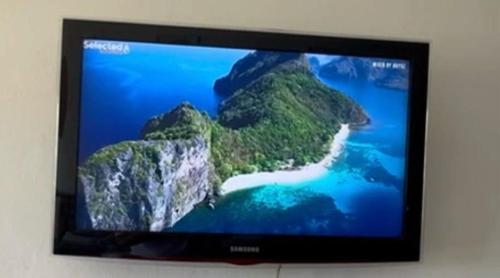 Et tv og/eller underholdning på Piriapolis Playa Grande Frente al mar