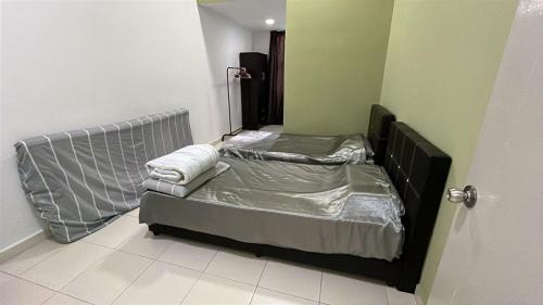 a room with two beds in a room at 1091 LUX Conner in Port Dickson