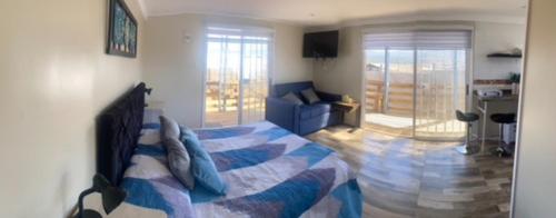 En eller flere senge i et værelse på Horizontes de Papudo