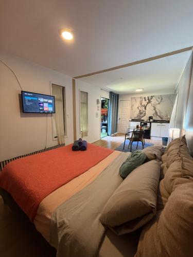 En eller flere senge i et værelse på Casa M Villa Alemana