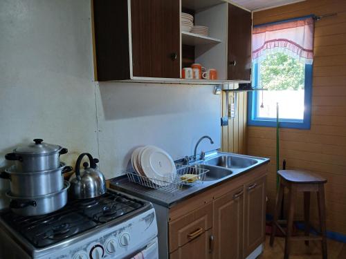 Kuchyň nebo kuchyňský kout v ubytování Cabaña de campo, Puacura - Castro