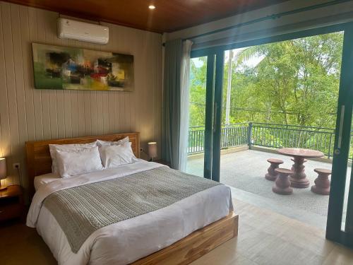 Giường trong phòng chung tại Bali Praya House