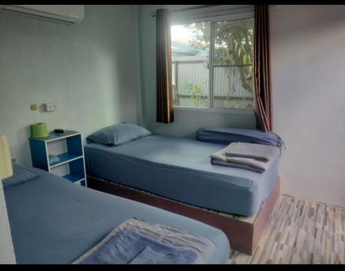 En eller flere senge i et værelse på Canaan