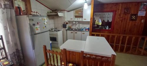 Køkken eller tekøkken på Departamento a pasos del centro de Dalcahue