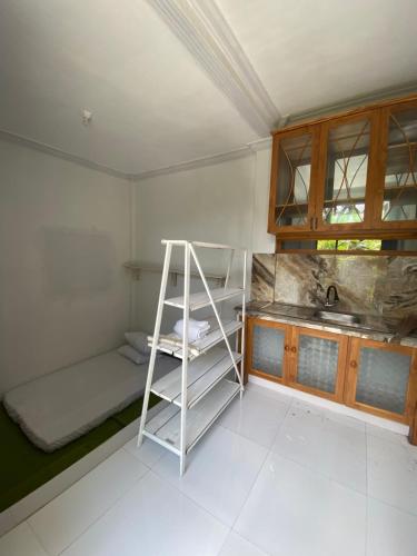 Letto o letti a castello in una camera di abneina pro homestay