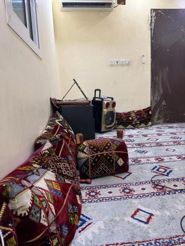 Postel nebo postele na pokoji v ubytování وحدة سكنية