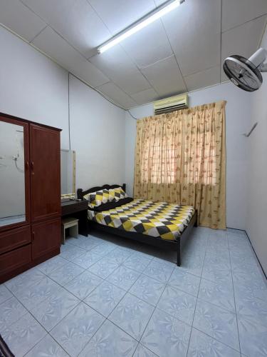 Giường trong phòng chung tại HOMESTAY NO.45