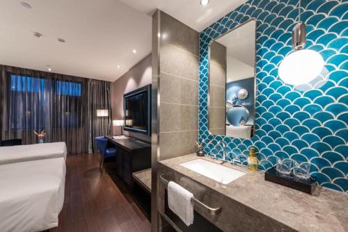 Et badeværelse på Orange Crystal Hotel Qingdao Jimo Ancient Town