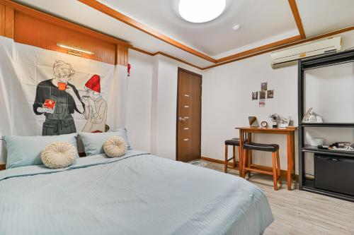 Postel nebo postele na pokoji v ubytování MIIN Stay02