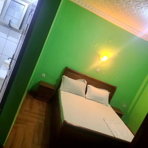 Llit o llits en una habitació de Résidence Dema 2