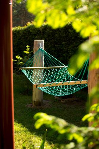 Un jardín fuera de Domki letniskowe i całoroczne w Kopalinie