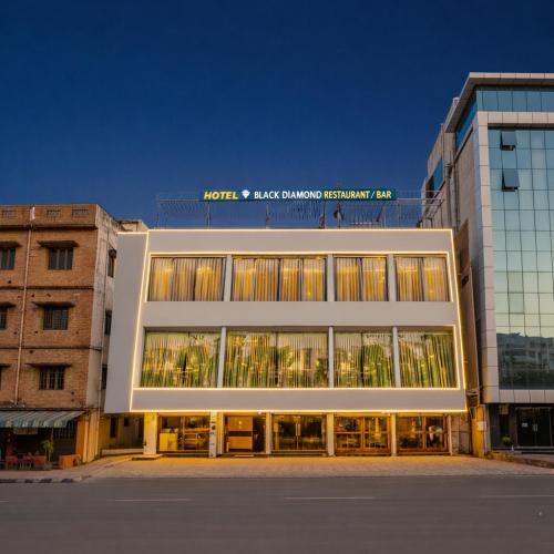 a large building with a lot of windows at Hotel Black Diamond, Patiala Chok 2 min from Zirakpur Bus Stand near Panchkula in Zirakpur