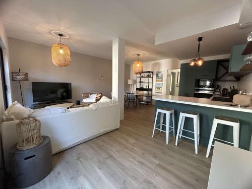 Appartement 6 pers avec patio, entre golf et océan