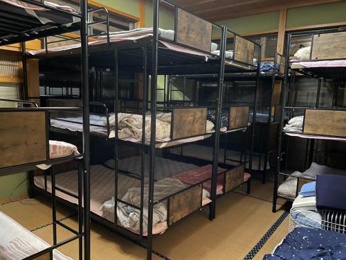 En eller flere senge i et værelse på Kominka Mimi - Vacation STAY 19741