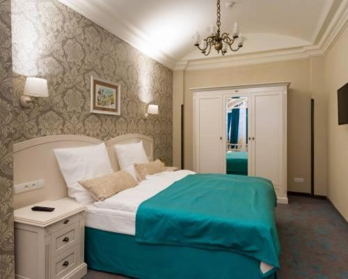 Postel nebo postele na pokoji v ubytování Dom Zdrojowy