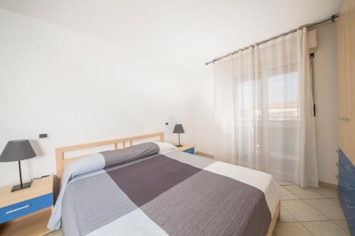 Residence Verbenaにあるベッド