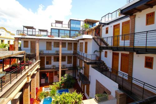 an aerial view of a building with balconies at Hotel Boutique Casa Carolina in Santa Marta