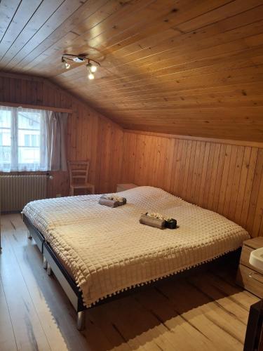 Postel nebo postele na pokoji v ubytování Haus Obergoms