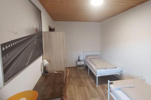 Postel nebo postele na pokoji v ubytování Ferienhaus in Pertersaurach-Langenloh bei Nürnberg