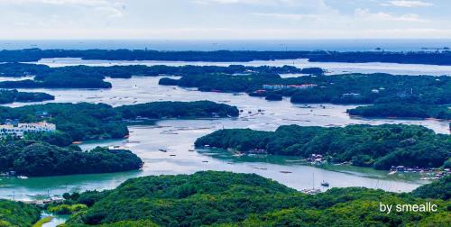 an aerial view of a river with boats in it at Hiogiso in Shima