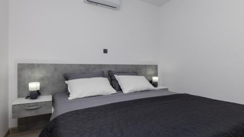 En eller flere senge i et værelse på Villa Klara - Makarska by Villas Guide