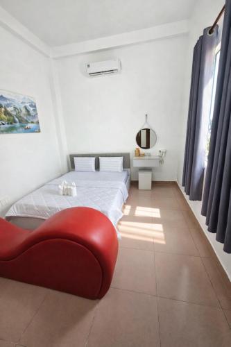 Giường trong phòng chung tại Ánh Sao Hotel HCM