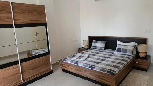 En eller flere senge i et værelse på Tchikobo hola