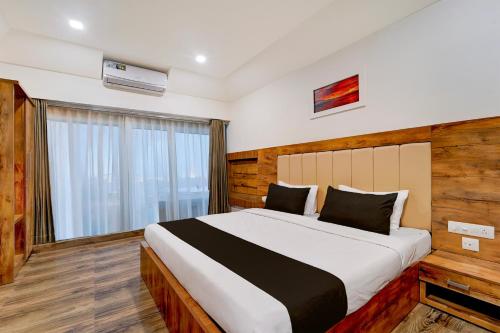 Giường trong phòng chung tại Hotel O OZONE Residency