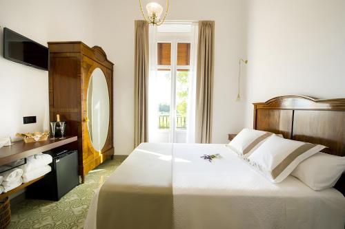 En eller flere senge i et værelse på Habitacion Camagroc