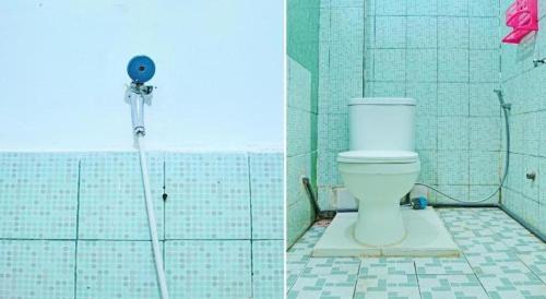 Koupelna v ubytování Hotel O Kost Axcel