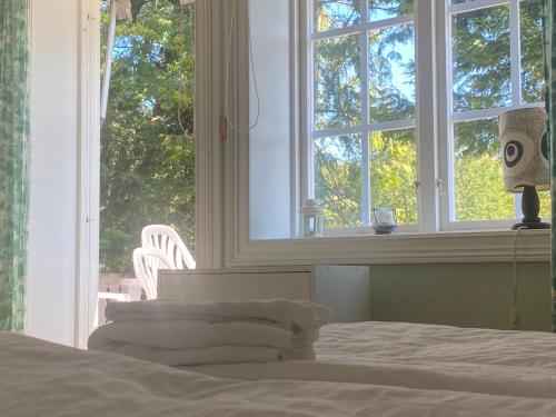 Postel nebo postele na pokoji v ubytování Spa For Hjo