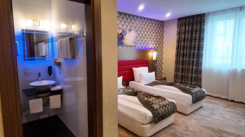 Et badeværelse på Airport Global Hotel