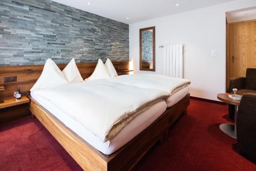 Säng eller sängar i ett rum på Hotel Continental