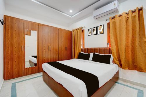 Giường trong phòng chung tại Varahi Stay Inn