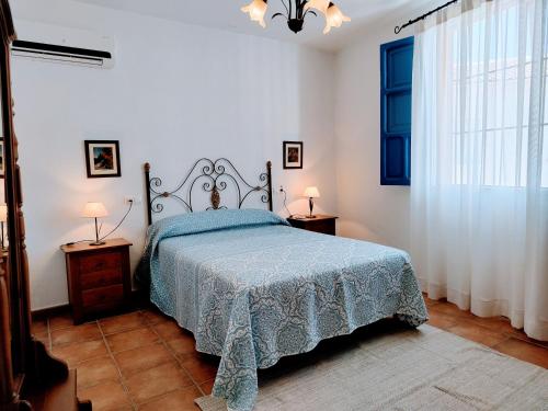 Giường trong phòng chung tại El Oasis de Castil 2