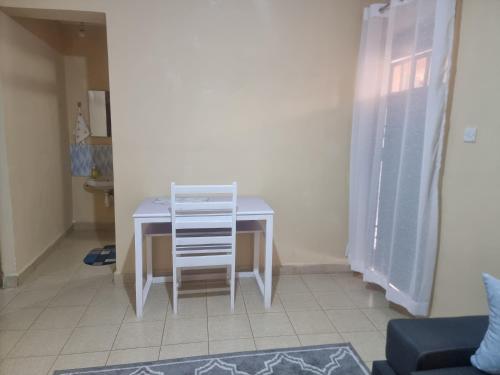 Ein Sitzbereich in der Unterkunft Smiley Stay