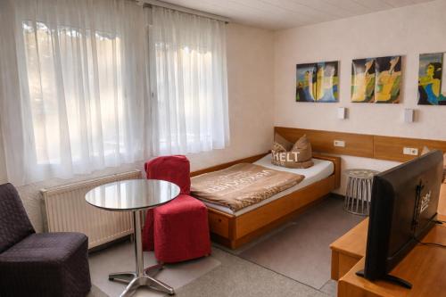 Khu vực ghế ngồi tại Pension Wolkenrasen