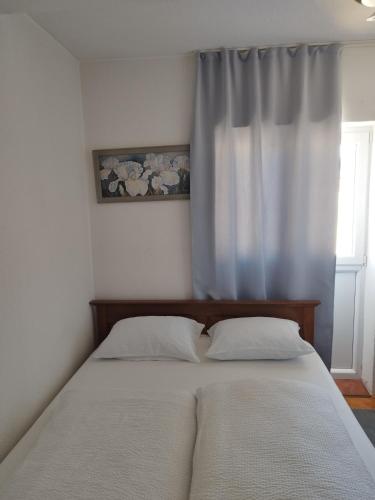 Krevet ili kreveti u jedinici u okviru objekta Apartman Luka