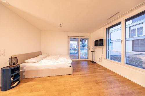 Postel nebo postele na pokoji v ubytování The R Apartment Vogelberg, Gym, Balkon, Parking