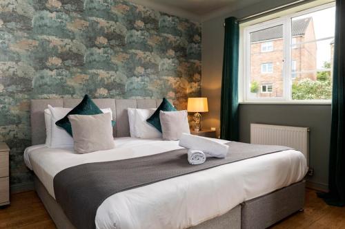 Postel nebo postele na pokoji v ubytování Bridges Retreat, Newcastle