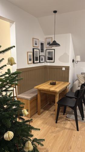 Posezení v ubytování Leśne Chatki - Apartamenty Świerk i Sosna