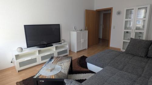 TV/trung tâm giải trí tại Schickes Apartment mit Stil - 58qm groß