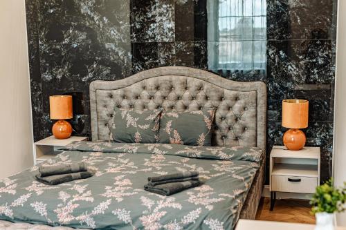 Giường trong phòng chung tại Vārves Muiža