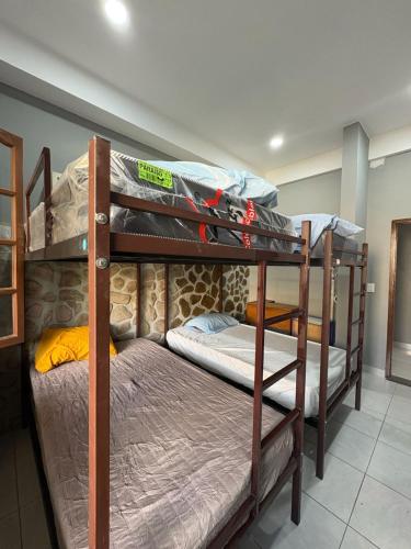 En eller flere senge i et værelse på Casa cómoda